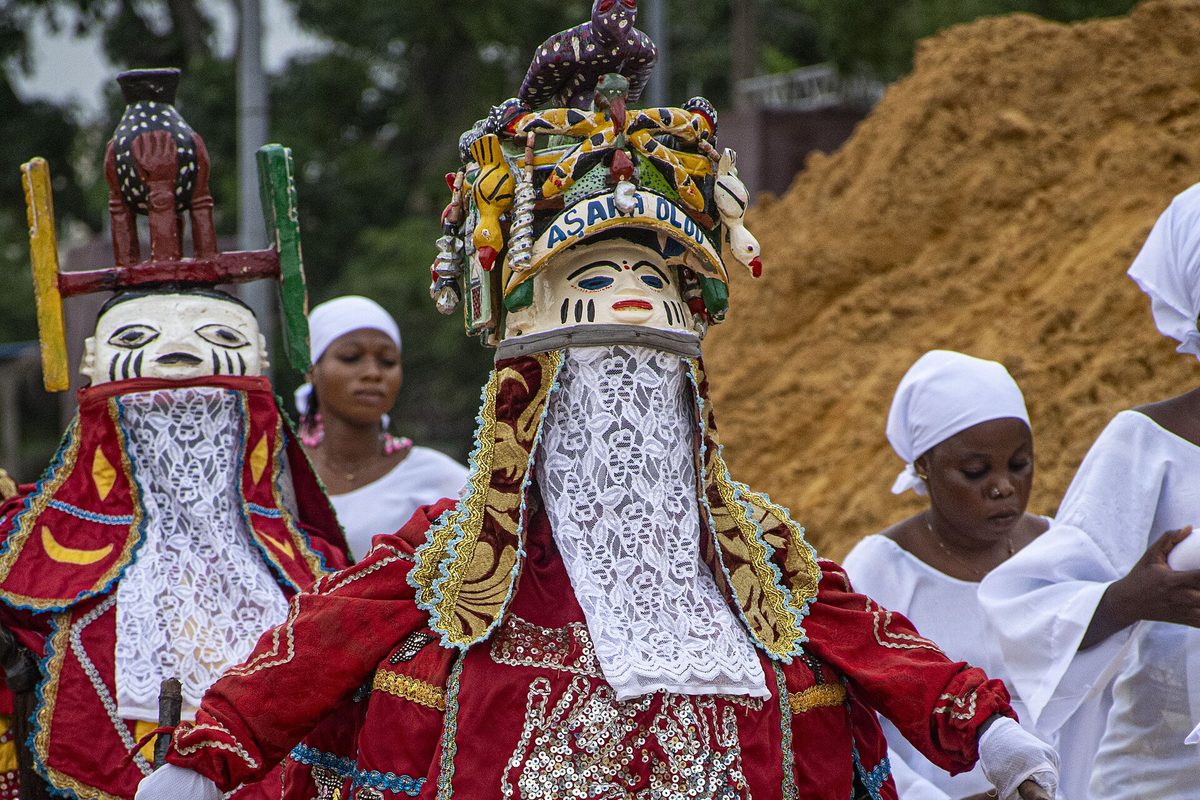 Egungun masquerade in embroidered ceremonial dress, Benin