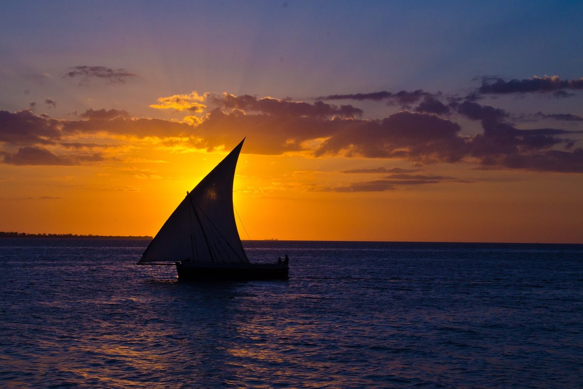 Lone dhow against a Zanzibar sunset
